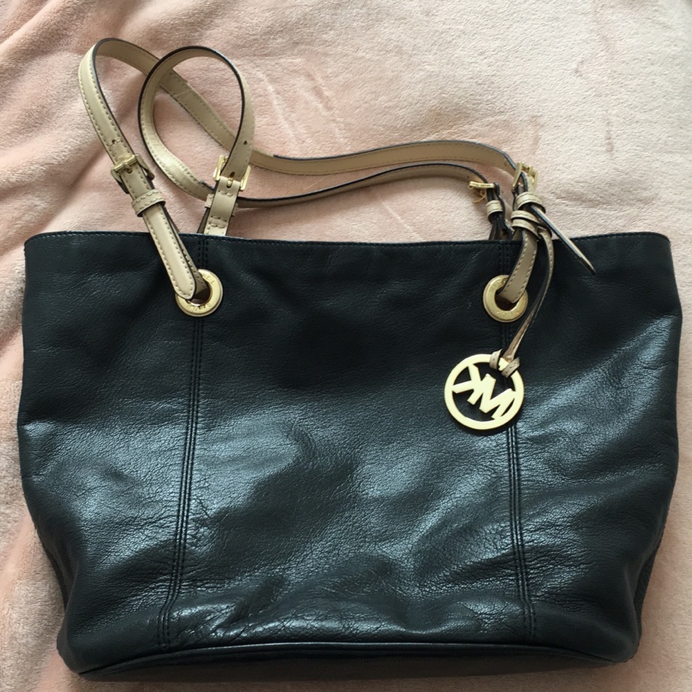 Leather Michael Kors purse with beige strap